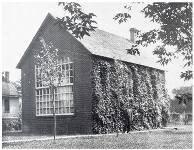 Picture of Krehbiel next to his studio